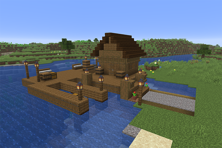 Small spruce fishing dock with a storage shed, lantern posts, barrels and a boat slip