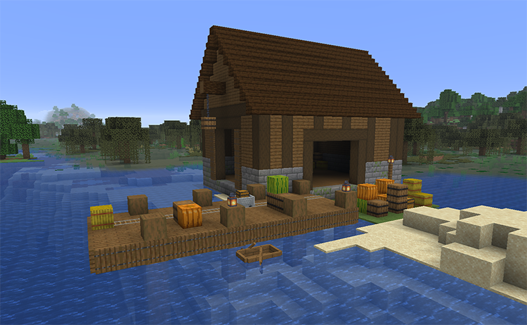 Wooden warehouse with large doors on a stone base beside a pier with rails, pumpkins, melons and barrels