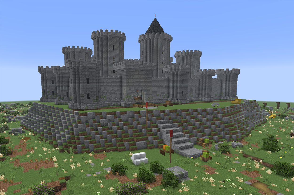 A Minecraft castle fortress with round towers