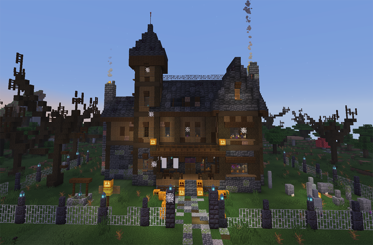 Haunted house in Minecraft with a tall tower, balcony, iron fence, and graves