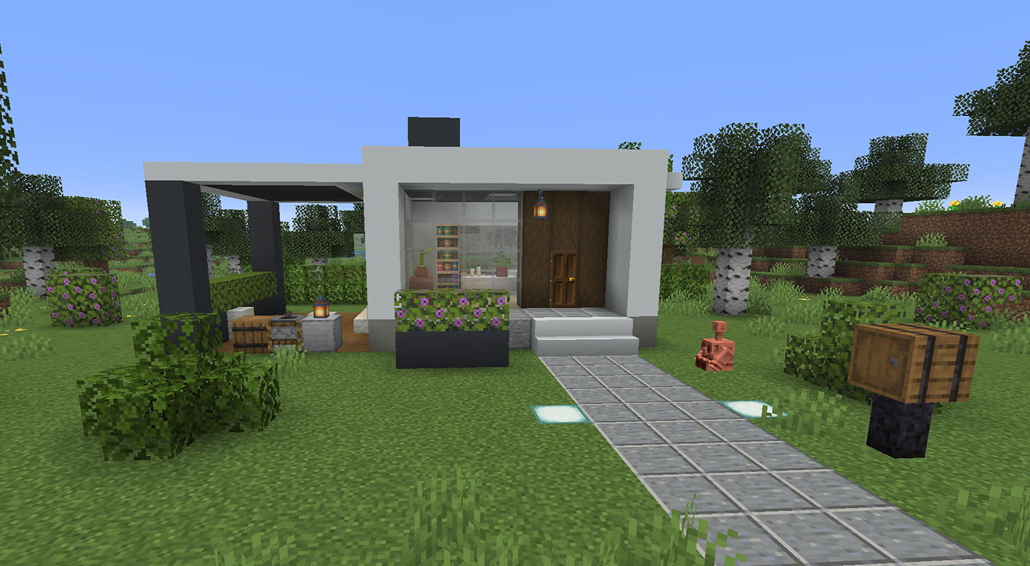 Small compact modern Minecraft house with a framed glass front, wood entry panel, skylight, and covered side patio with a grill