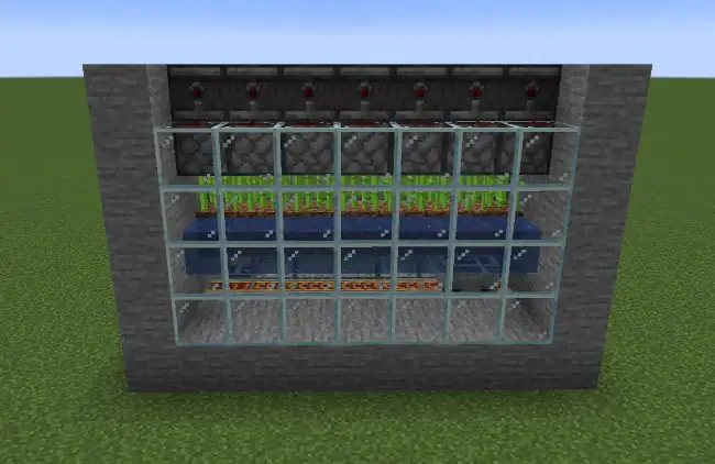 Back view of an automatic sugar cane farm in Minecraft