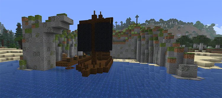 Pirate ship with black sails moored in a rocky cove next to a wooden jetty