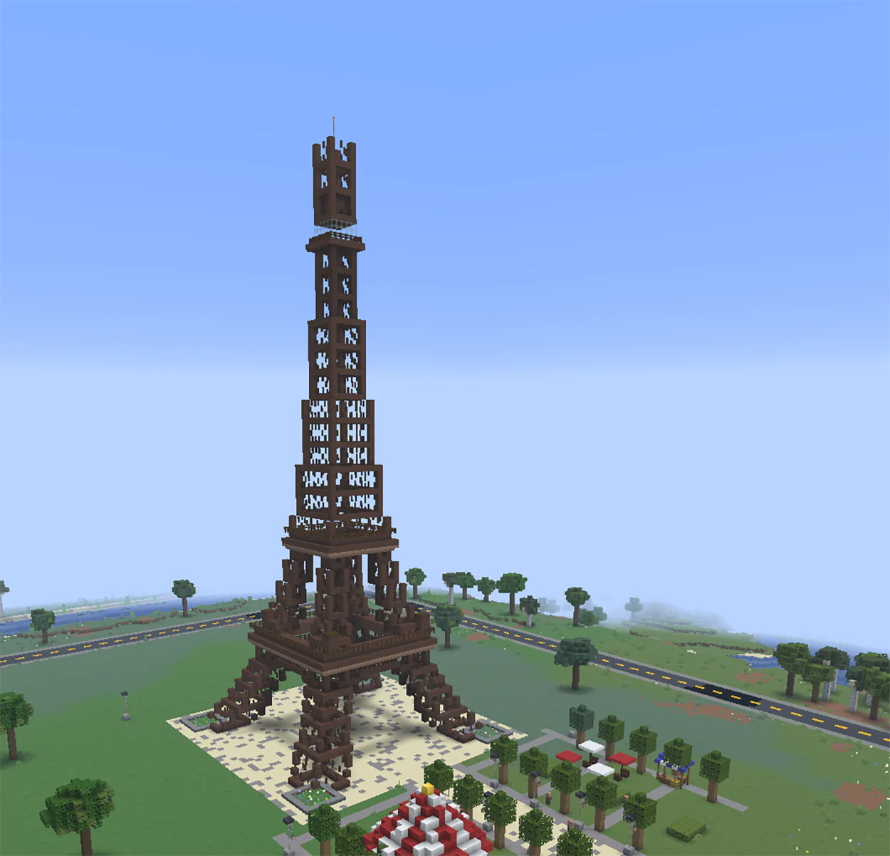 Minecraft Eiffel Tower built from brown terracotta and dark oak fences