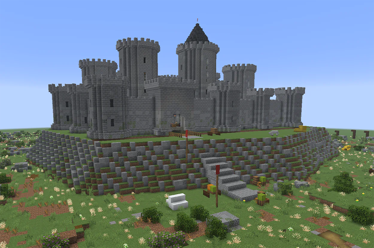 A Minecraft castle fortress with round towers