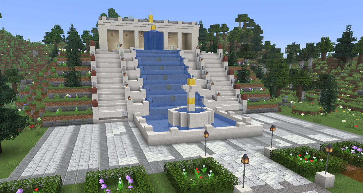 Minecraft cascade fountain with water flowing down quartz steps between two staircases