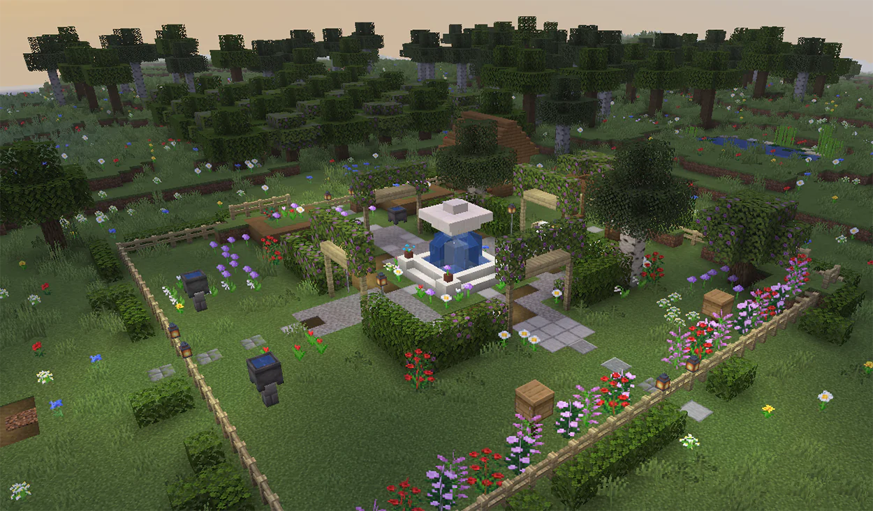 Small quartz fountain in a Minecraft garden with flowers and hedges