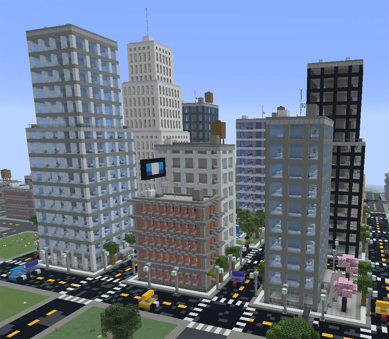A modern Minecraft city with glass skyscrapers, roads, sidewalks and a central park