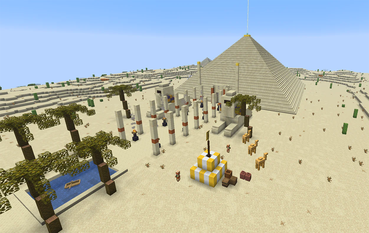 Minecraft sandstone pyramid with a beacon on top, sphinx statues and columned walkway